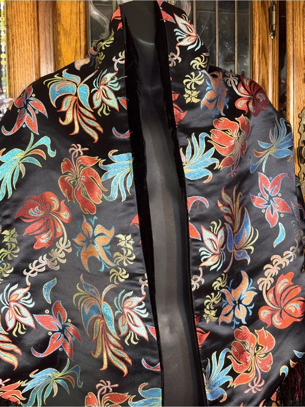 black floral embroidered silk like boho shawl featuring long fringe trim